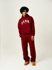 Model Männlich Schräg in CESA C1 Hoodie "BORDEAUX"